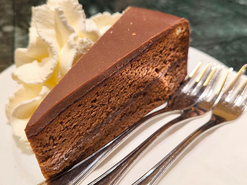 Traditional Austrian Sachertorte with cream